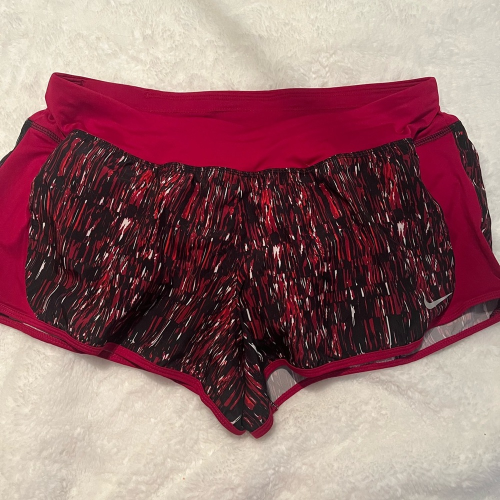 Women’s Geometric silk style (clingy) Nike Dr-Fit Running shorts. L
